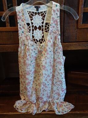 Floral Sleeveless Top with Ruffled Bottom